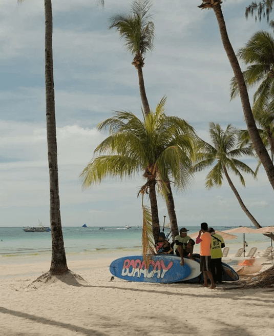 Boracay White Beach & Iconic Surfboard under Coconut Palms
