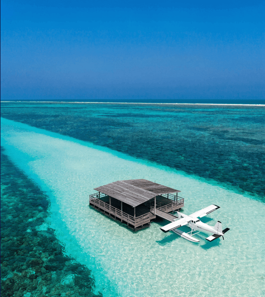 Maldivian Island Seaplane Docked on Azure Waters